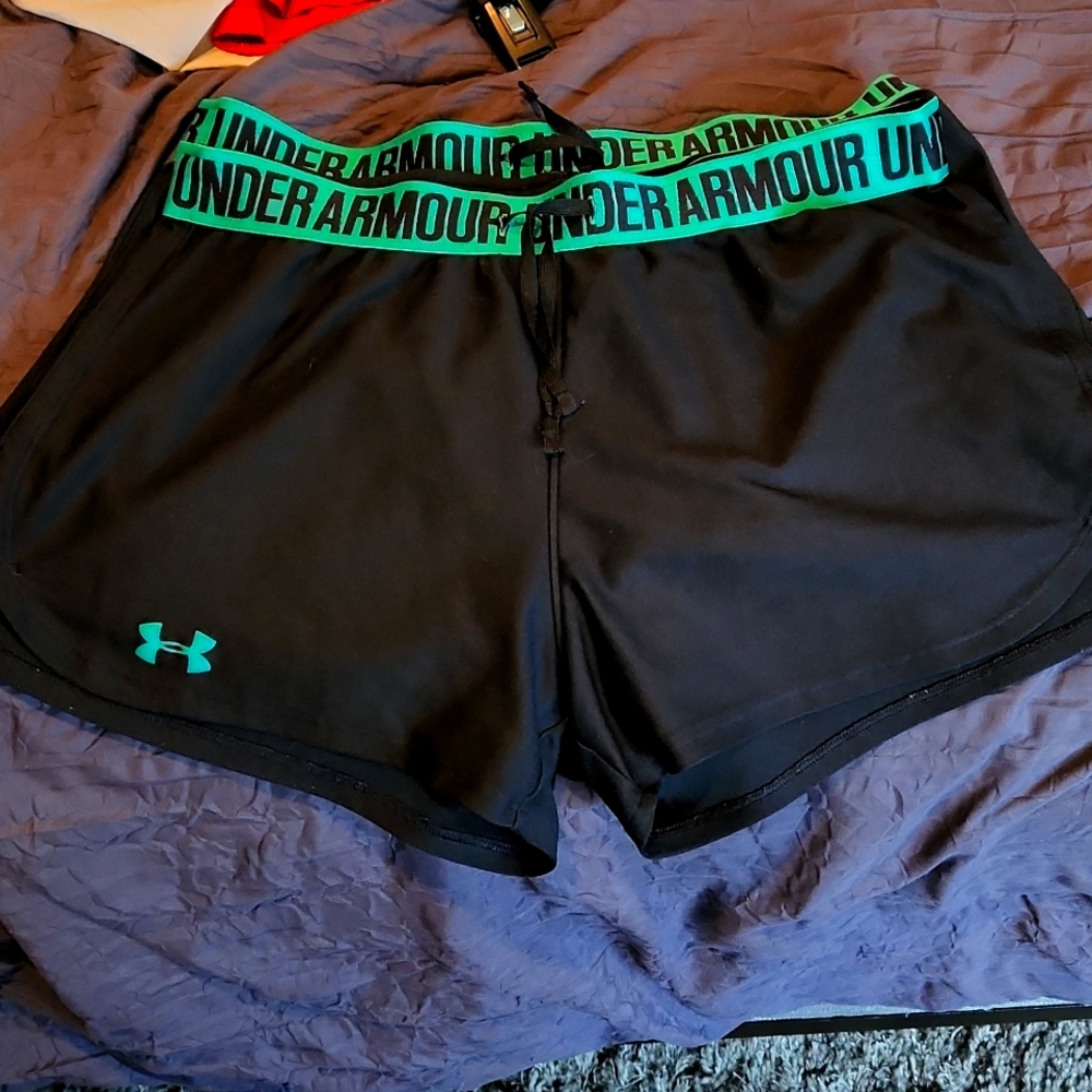 Under Armour athletic shorts,  size medium.  Selling separately